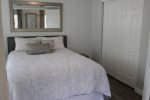 Queen bed and spacious closet in second guest bedroom